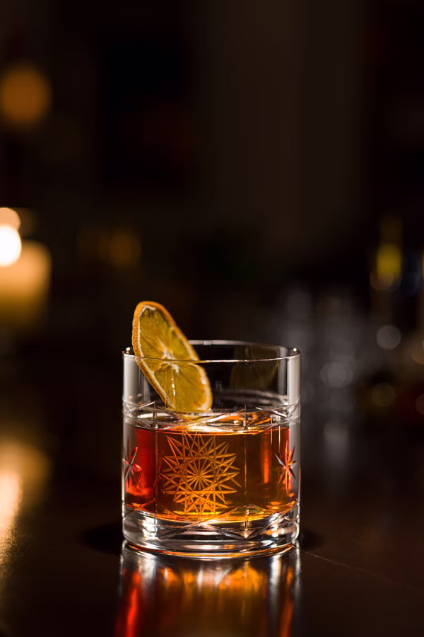 Signature pink cocktail in a coupe glass